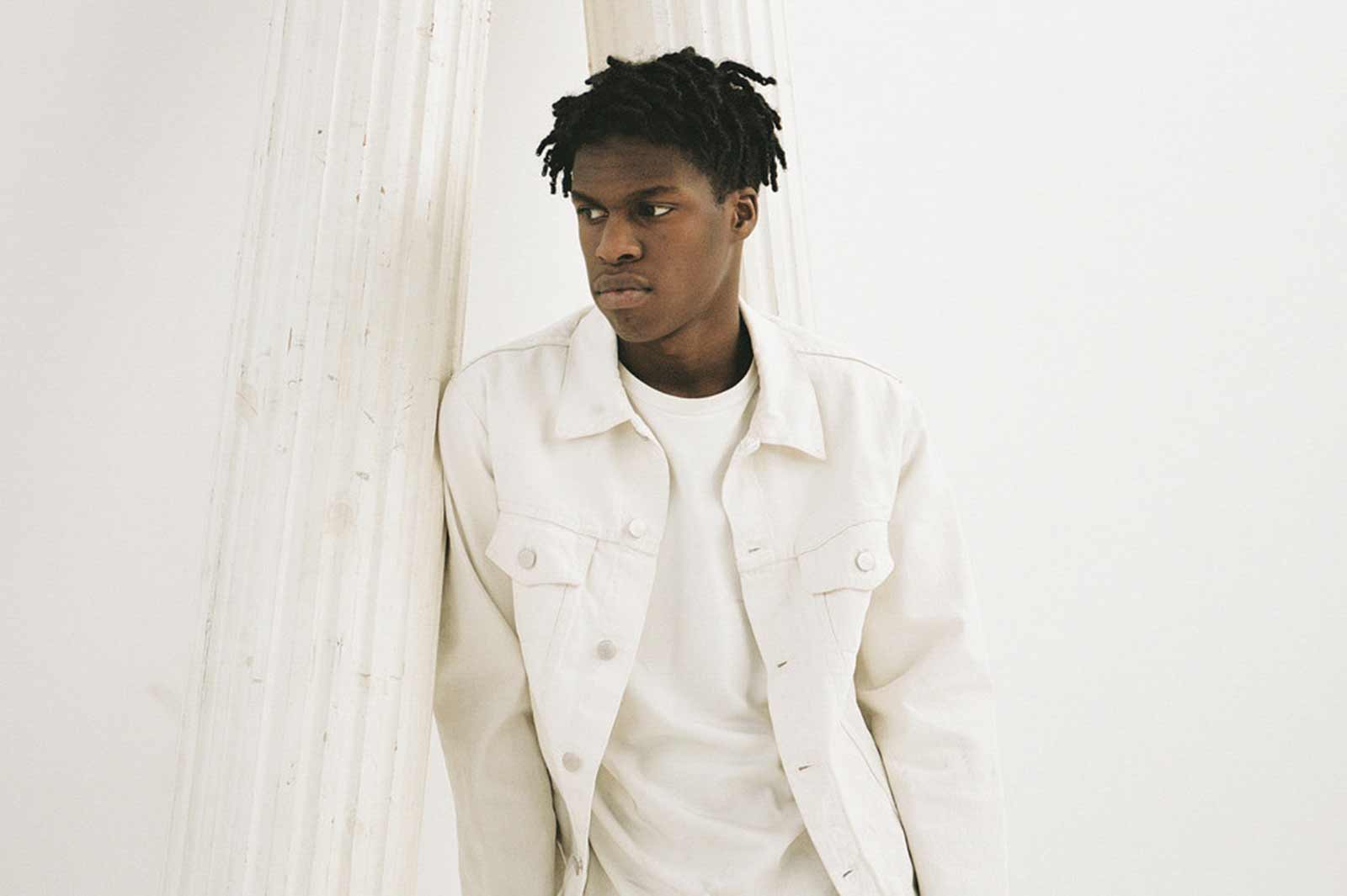 A promo image of Daniel Caesar