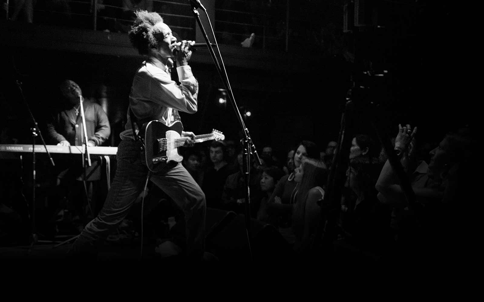 An image of Fantastic Negrito performing