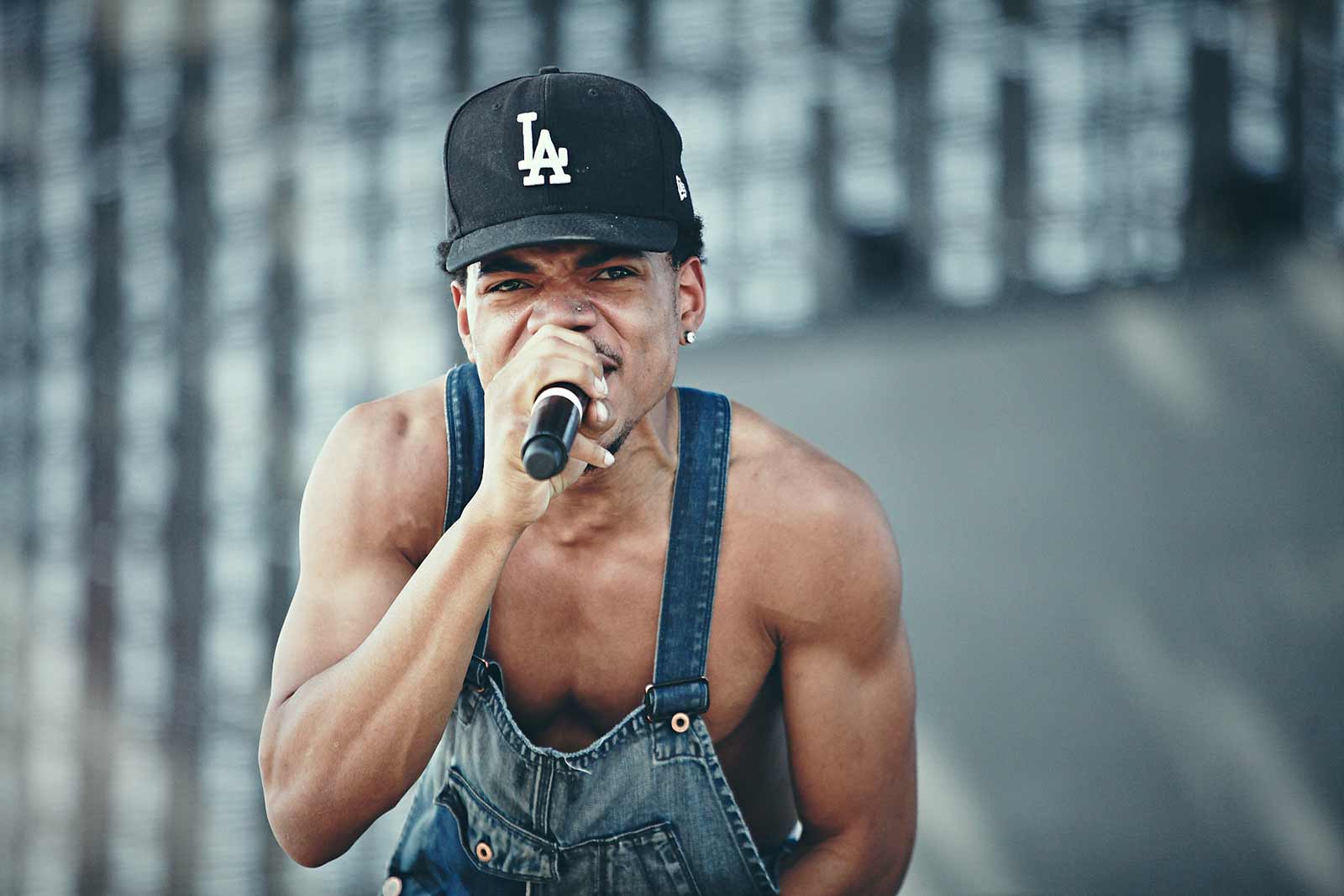An image of Chance the Rapper performing live.